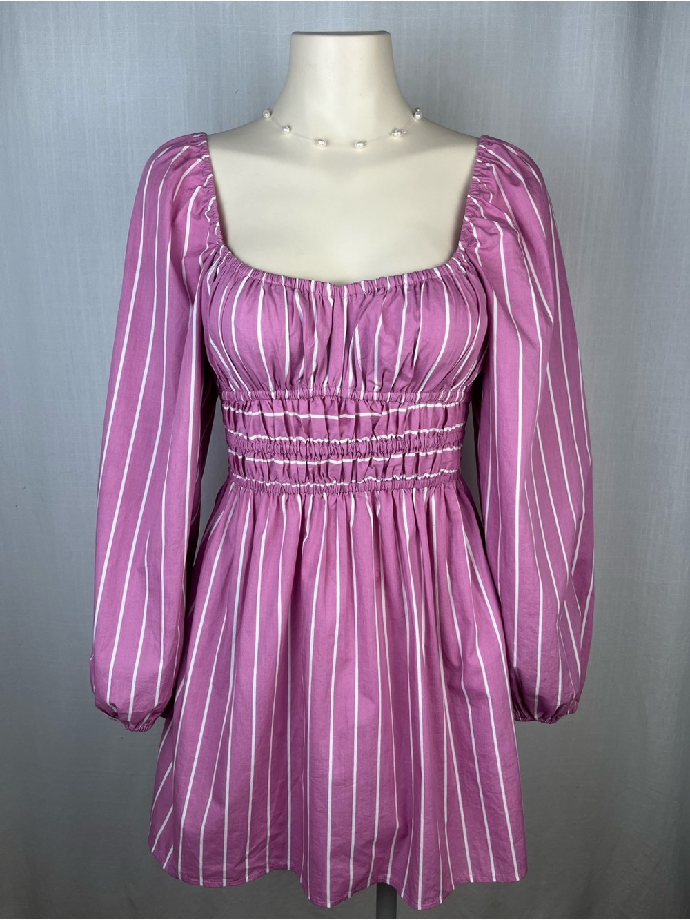 Faithfull the Brand Pink and White Long Sleeve Smocked Waist Dress